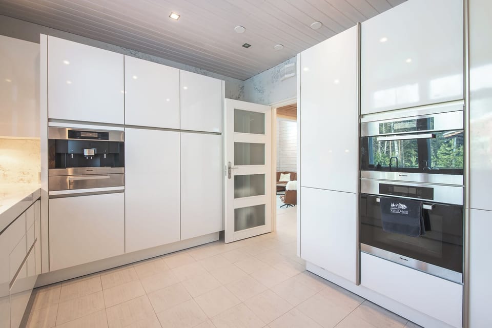 Luxury Villa, Lake View, Executive Level | Private kitchen | Full-size fridge, microwave, oven, stovetop
