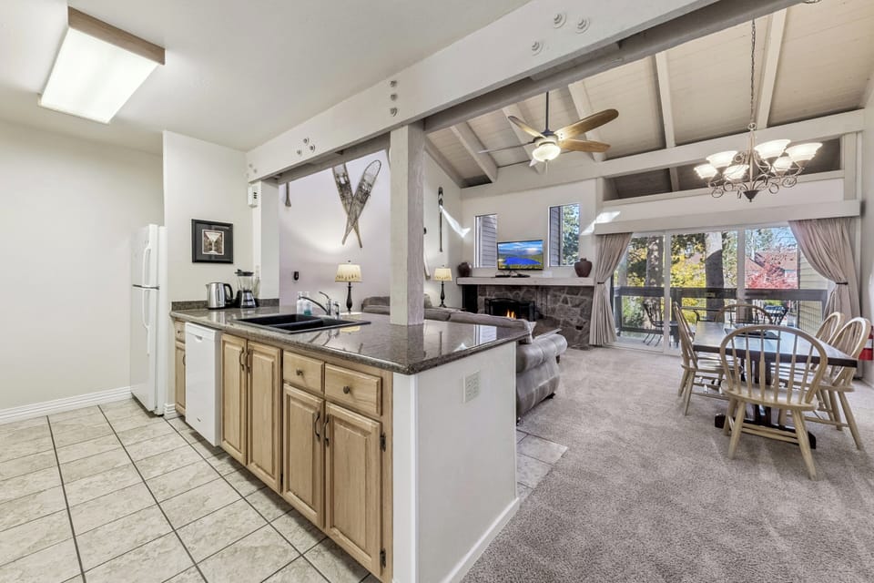 Your spacious open-plan kitchen flows into the cozy living area, where you'll love cooking while staying connected with family.