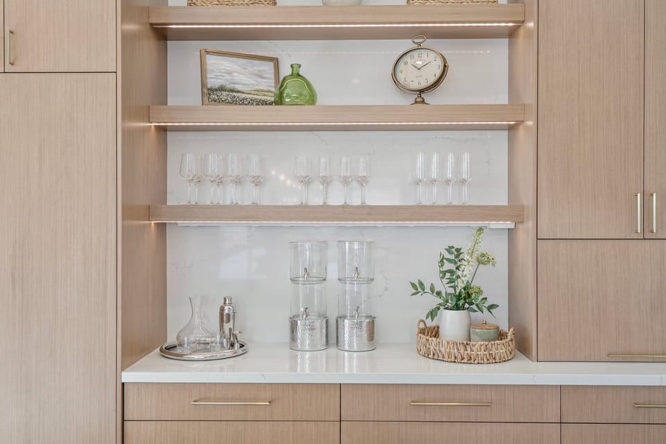 The well appointed chefs kitchen has just about everything you could possibly want including place settings for 16+, new cookware and upgraded kitchen amenities throughout