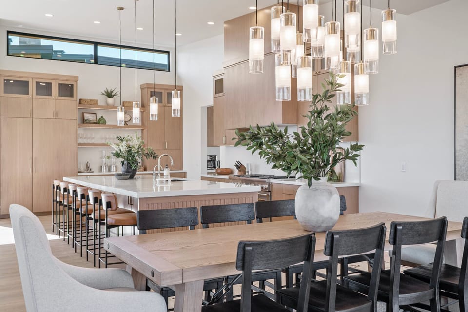 A massive fully appointed chefs kitchen with bar stool seating for 6 plus a large dining room with extra leafs that seats as many as 14