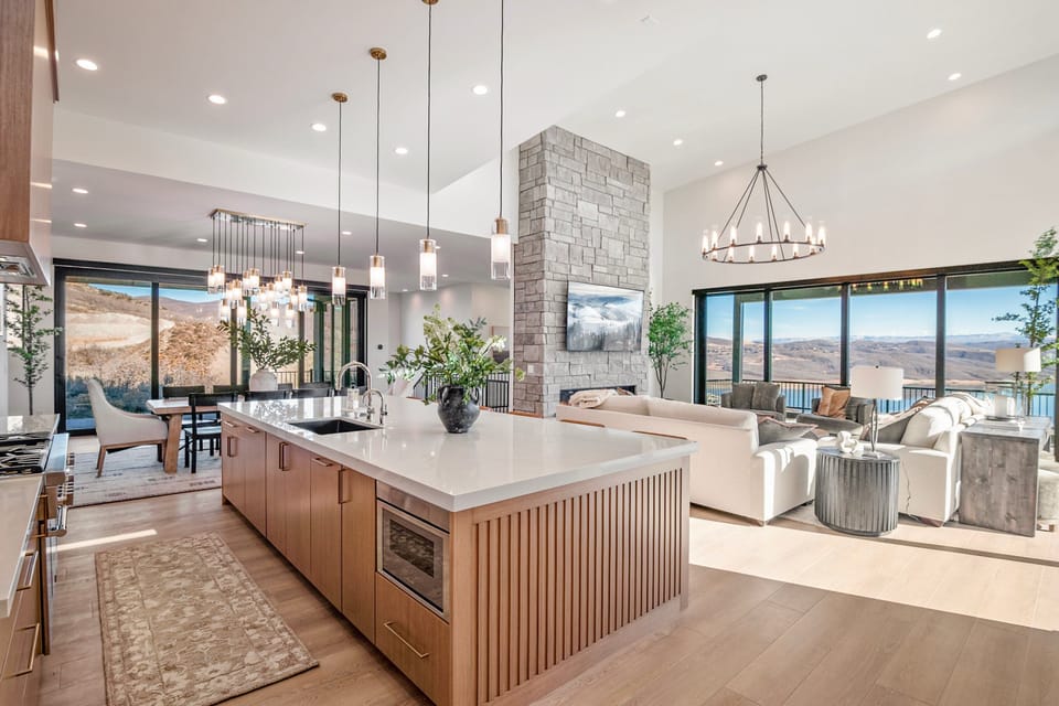The kitchen island is a feature unto itself with bar seating for 8, several appliances and tons of space to prepare an amazing meal for friends and family