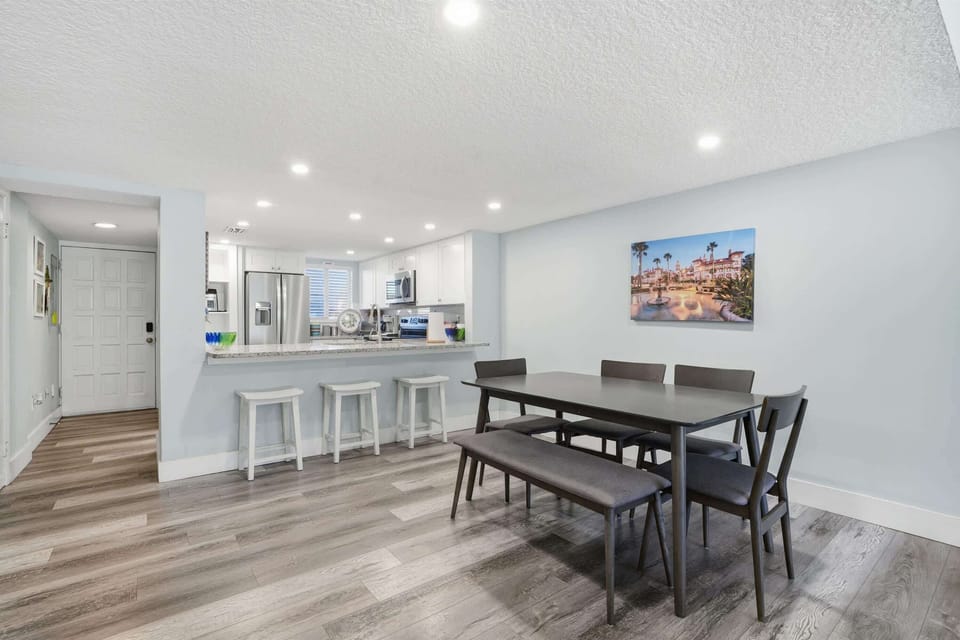Modern open-concept living, dining, and kitchen area for easy flow.