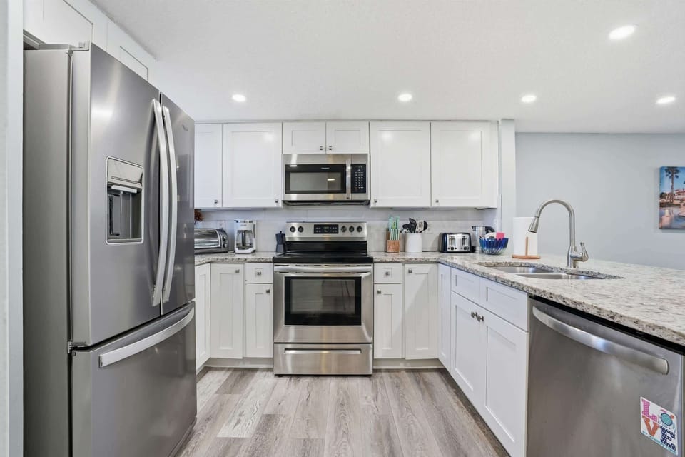 Cook delicious meals in the fully equipped kitchen with modern appliances.
