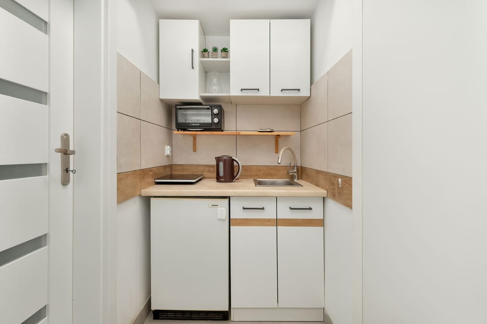 The kitchen's modern appliances make meal preparation easy.