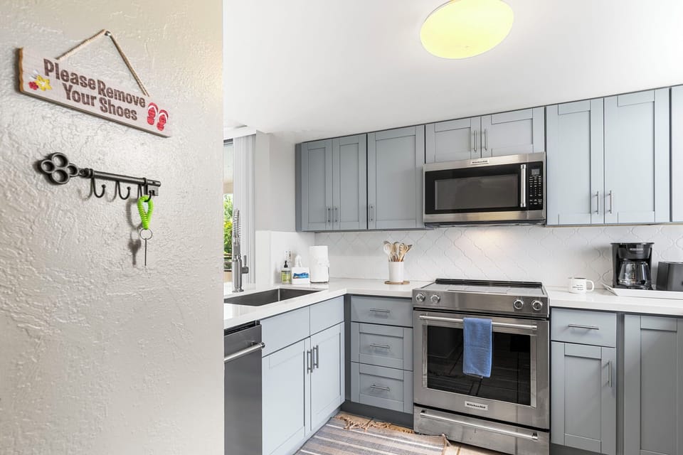 Condo, Multiple Beds, Lanai, Garden View (White Sands Village 224) | Private kitchen | Electric kettle