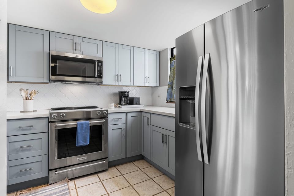 Condo, Multiple Beds, Lanai, Garden View (White Sands Village 224) | Private kitchen | Electric kettle