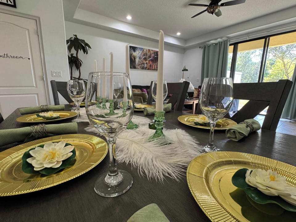 Enjoy elegant dining with a beautifully set table, featuring charming details for a memorable meal