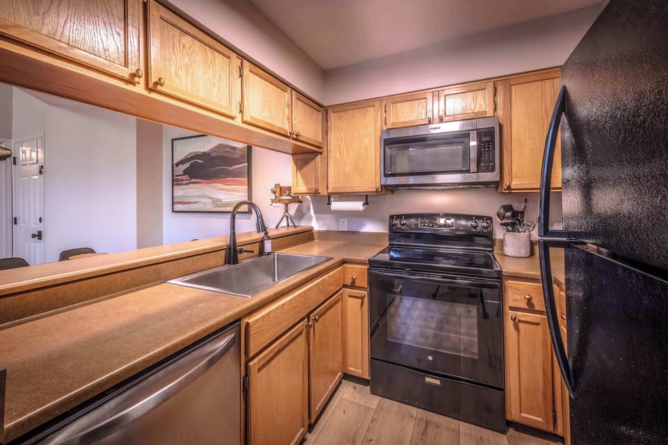 Well-stocked kitchen offering everything needed for home-style cooking.