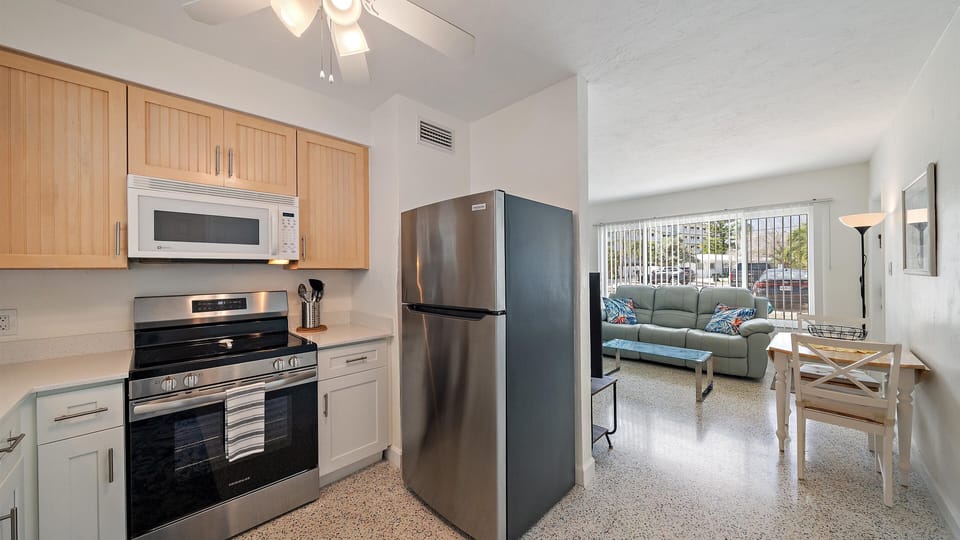 Fully stocked kitchen with cooking essentials for your stay.
