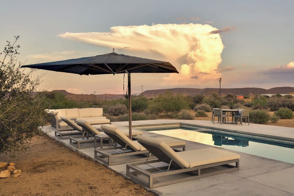 Shaded loungers by the pool