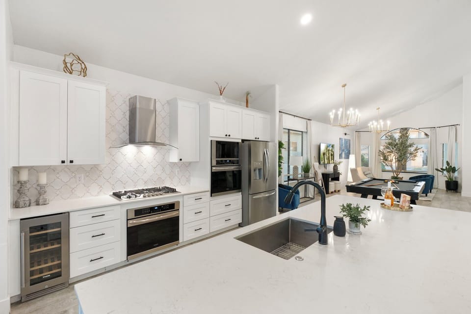 Large kitchen with wine cooler . All beverages are complementary