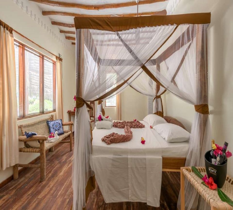 Deluxe Family, Ocean View | In-room safe, desk, iron/ironing board, bed sheets