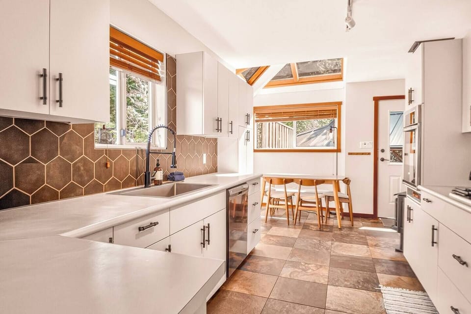 Beautifully updated kitchen with a seamless flow into the dining space—perfect for gathering and entertaining.