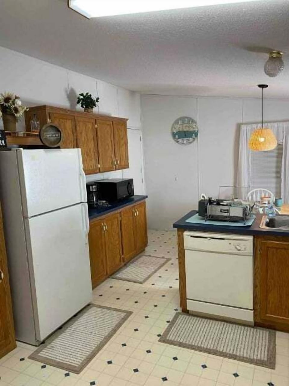 Kitchen with dishwasher, microwave and full-size refrigerator!