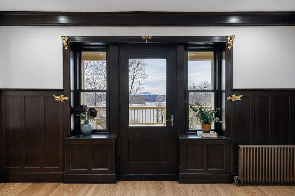 Step into sophistication with rich wood details and stunning river views!