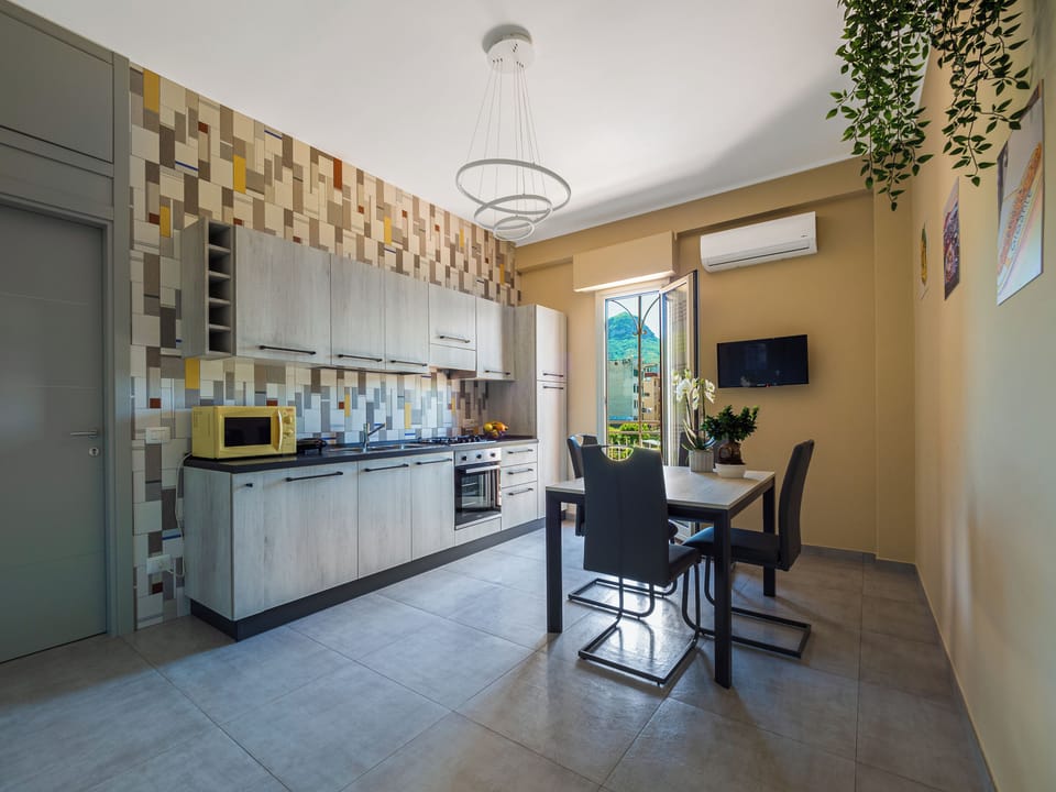 Comfort Apartment, Balcony | Private kitchen | Fridge, microwave, oven, stovetop