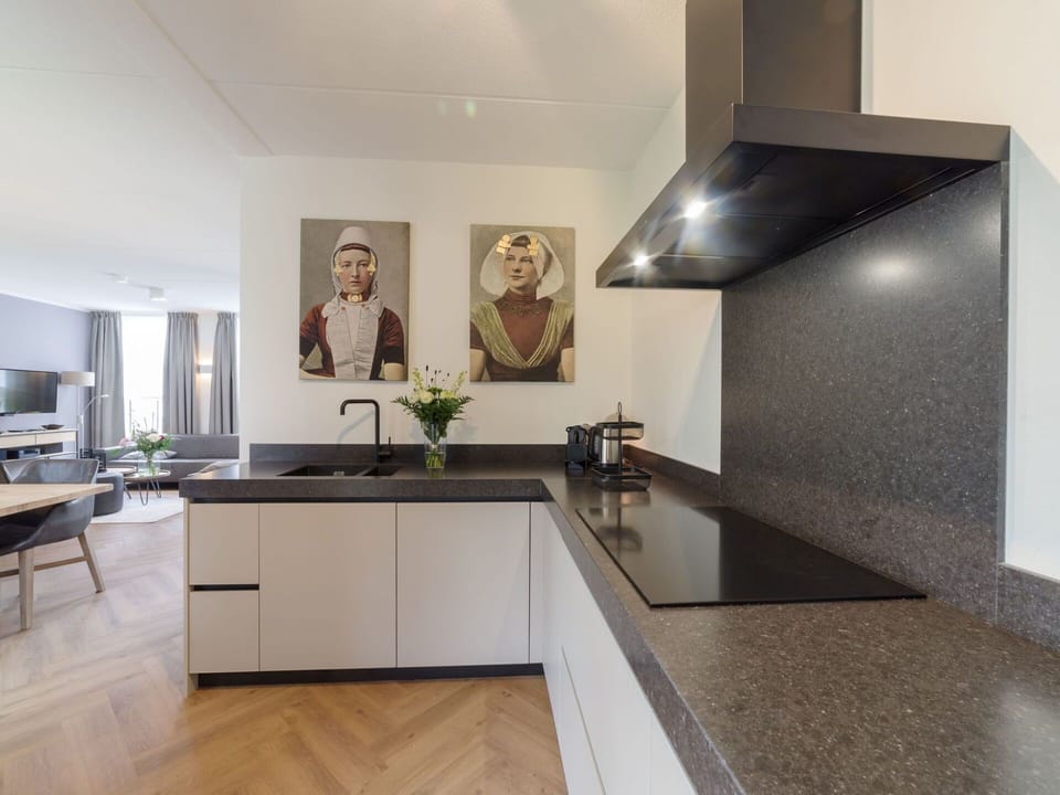 Interior Design, Kitchen, Flooring, Countertop, Home, Ceiling, Cabinetry, Kitchen Stove, Light Fixture, Home Appliance