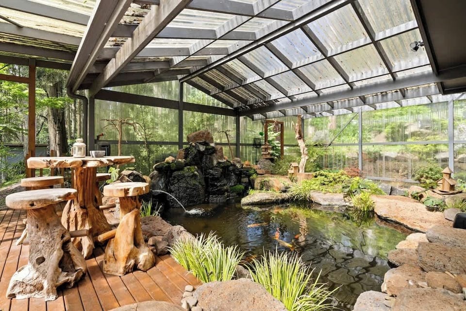 Enjoy sitting by the Koi pond with fish to unwind