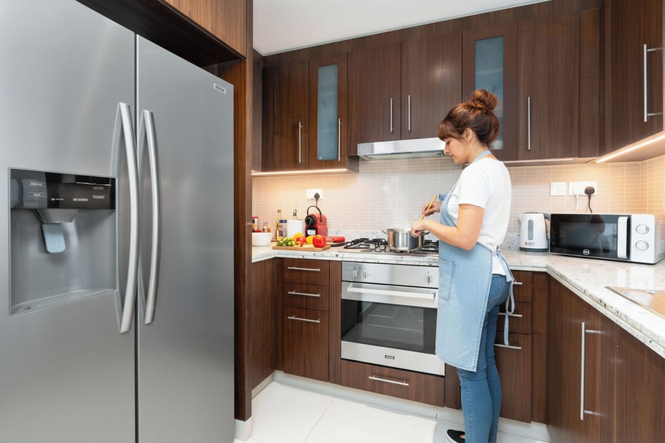 Luxury Apartment, City View | Private kitchen | Fridge, microwave, oven, stovetop