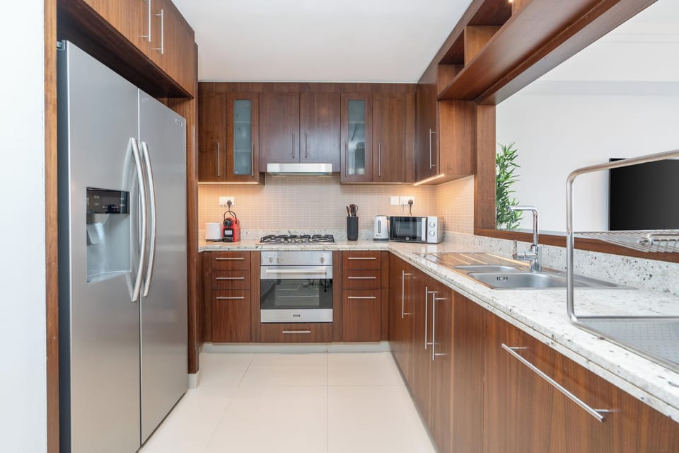 Luxury Apartment, City View | Private kitchen | Fridge, microwave, oven, stovetop