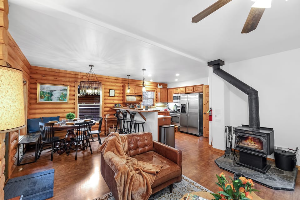The open-concept main floor is all about good vibes, letting you skip from kitchen to couch with ease and enjoy every moment with your crew