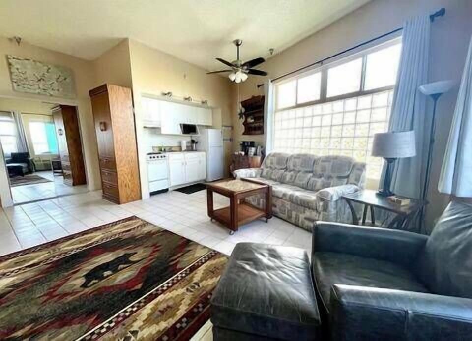 A relaxing living area featuring a comfortable sofa perfect for unwinding.