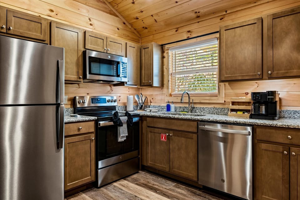 Fully stocked kitchen with stainless appliances and everything you need.