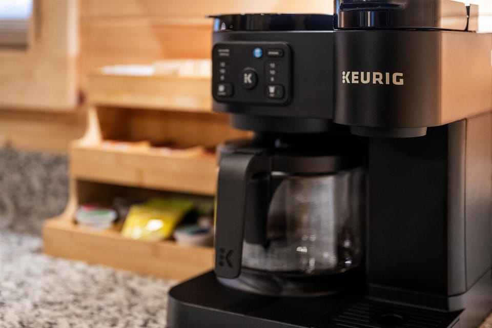 Coffee bar with pods, tea, and everything for your morning routine.