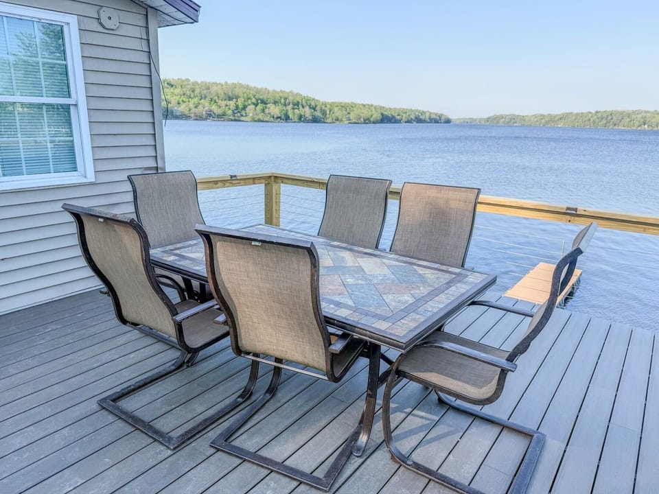 Lakeside deck dining with stunning water views right at your doorstep