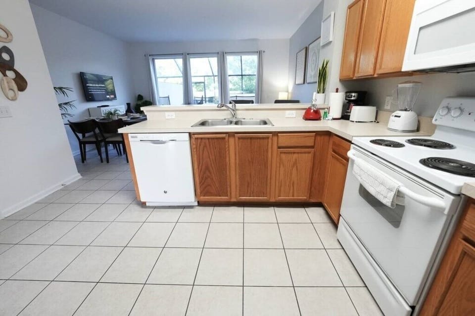 Kitchen with view to Living Area and Pool
