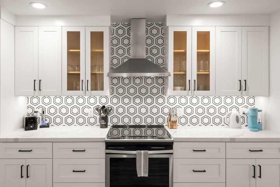 Modern appliances and a fully stocked kitchen make cooking at home a breeze.
