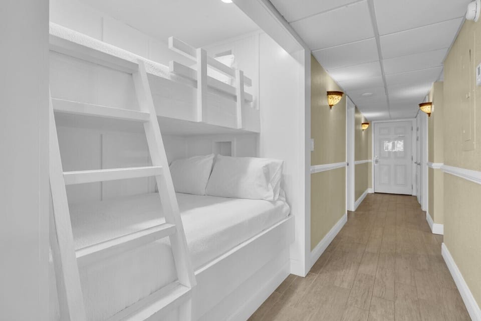 Built-in bunk beds offer a cozy sleeping space perfect for kids or extra guests