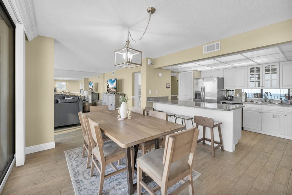 Spacious open-concept dining area with seating for six and easy flow to the kitchen