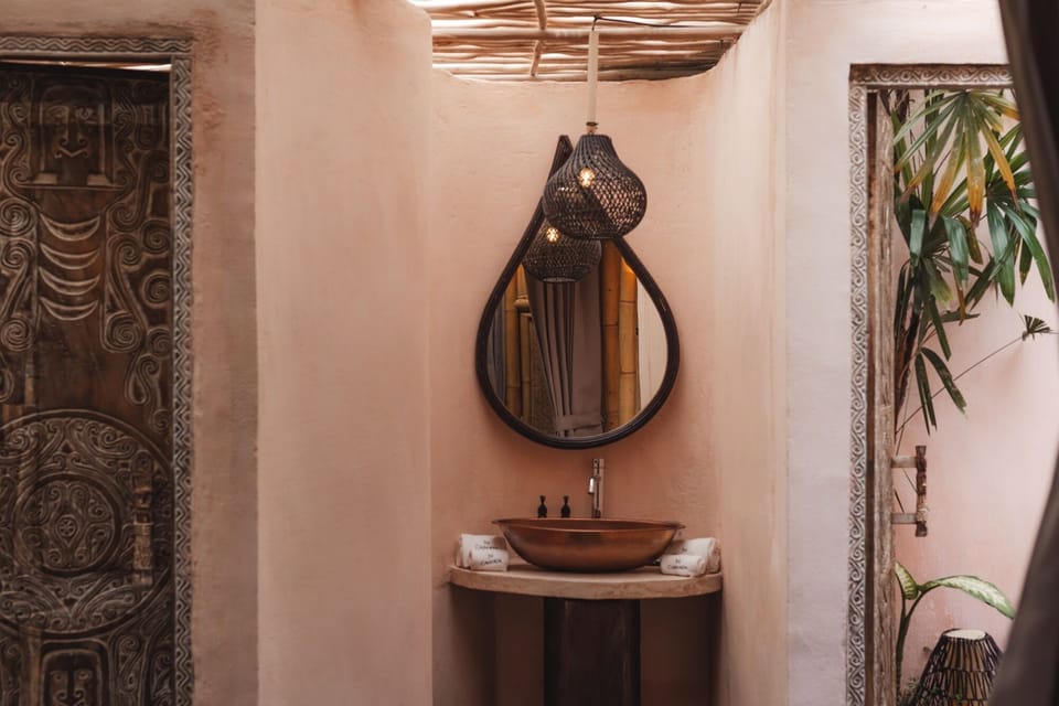 Pyramid Bamboo house | Bathroom | Bathrobes, slippers, bidet