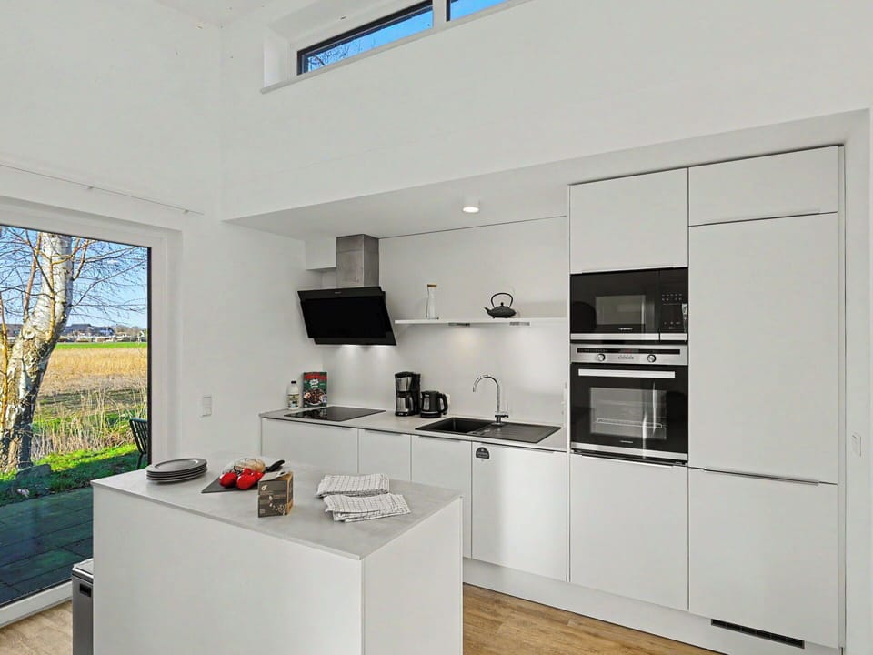 Kitchen, Countertop, Kitchen Appliance, Flooring, Interior Design, Cabinetry, Major Appliance, Ceiling, Home Appliance, Kitchen Stove