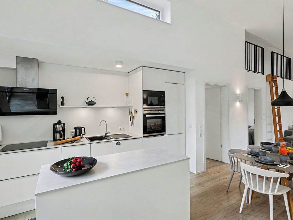 Kitchen, Interior Design, Countertop, Furniture, Flooring, Kitchen Appliance, Light Fixture, Ceiling, Wood, Cabinetry