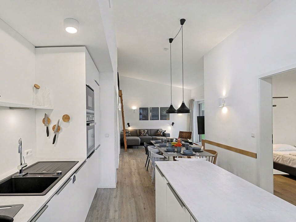 Interior Design, Flooring, Ceiling, Kitchen, Furniture, Floor, Light Fixture, Countertop, Lighting, Room