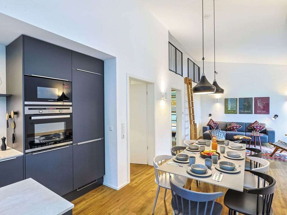 Interior Design, Flooring, Furniture, Ceiling, Kitchen, Floor, Room, Wood Flooring, Countertop, Lighting