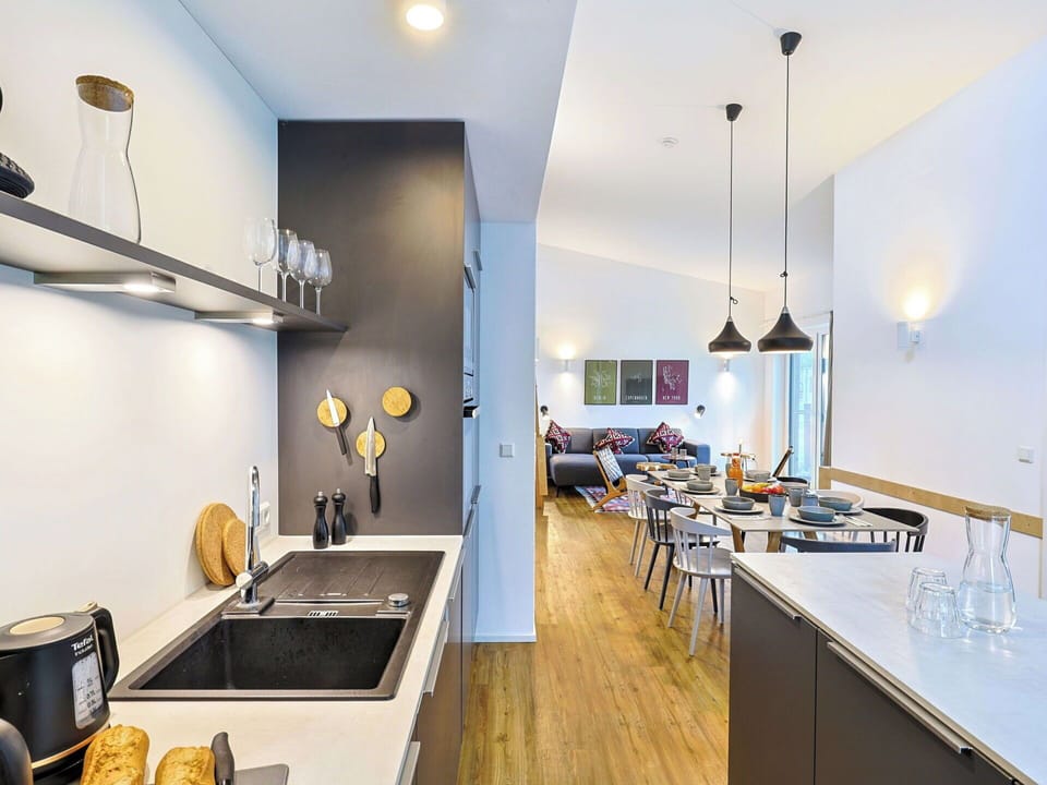 Kitchen, Interior Design, Countertop, Furniture, Flooring, Ceiling, Light Fixture, Floor, Kitchen Appliance, Room