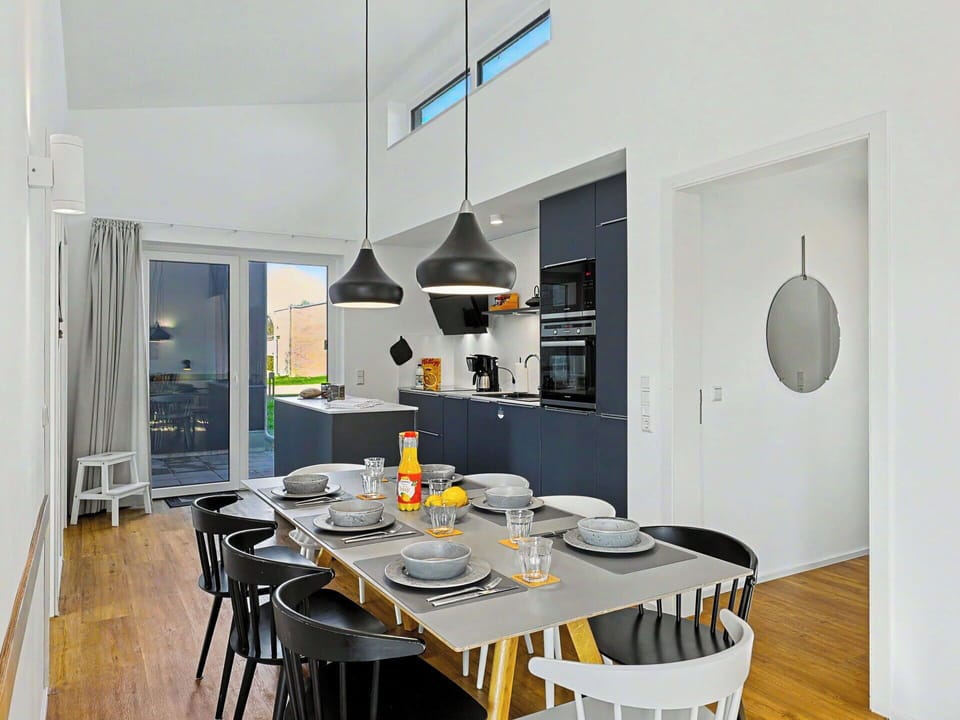 Furniture, Kitchen, Interior Design, Flooring, Light Fixture, Ceiling, Countertop, Chair, Kitchen & Dining Room Table, Lighting