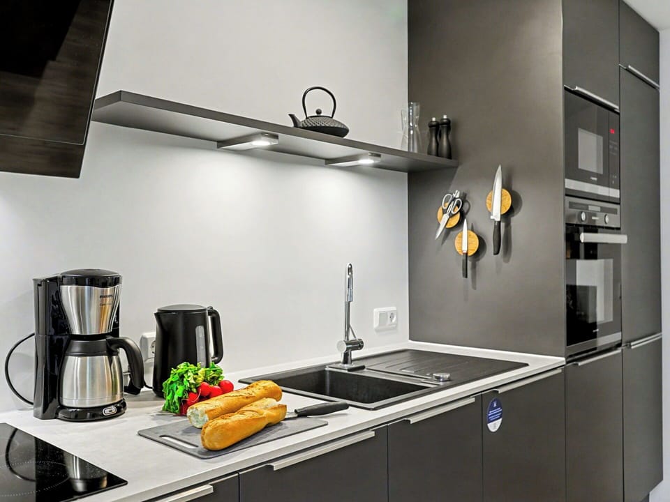 Kitchen, Kitchen Appliance, Countertop, Home Appliance, Kitchen Stove, Major Appliance, Stove, Cabinetry, Gas Stove, Interior Design