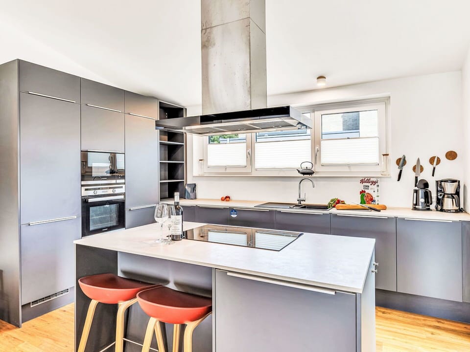 Kitchen, Kitchen Appliance, Countertop, Furniture, Interior Design, Cabinetry, Flooring, Major Appliance, Home Appliance, Wood