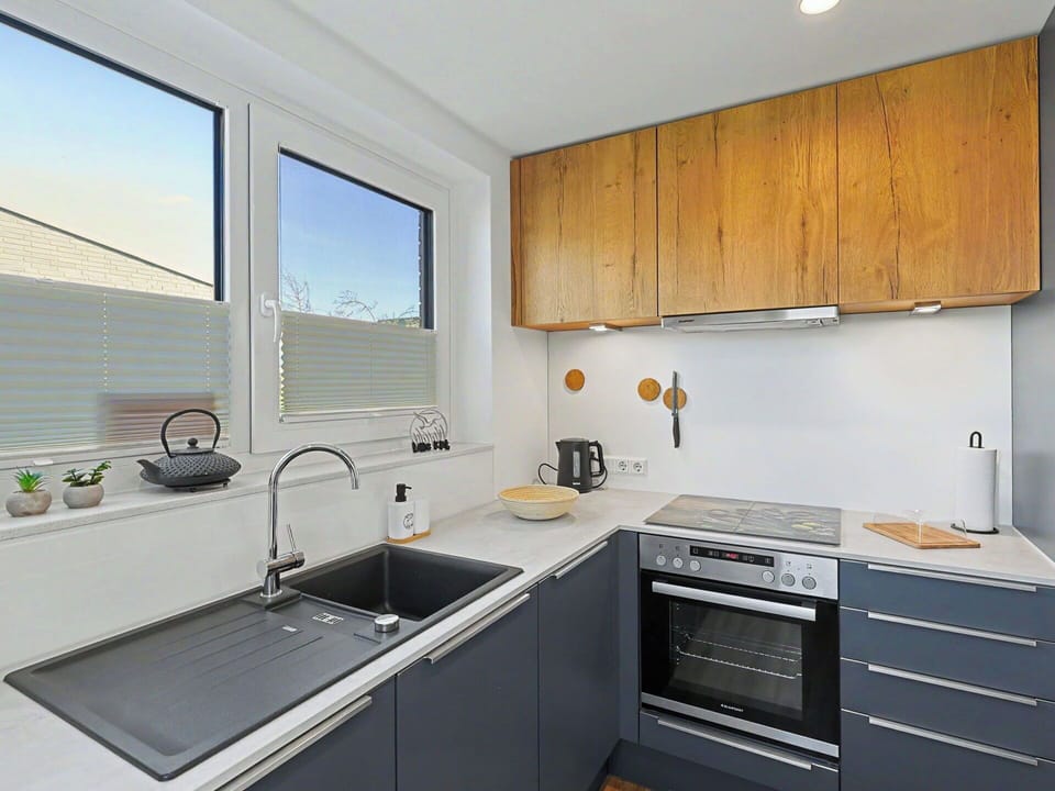 Kitchen, Countertop, Kitchen Appliance, Kitchen Sink, Cabinetry, Major Appliance, Interior Design, Wood, Home Appliance, Plumbing Fixture