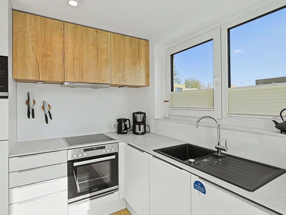 Kitchen, Countertop, Kitchen Appliance, Cabinetry, Flooring, Wood, Major Appliance, Interior Design, Kitchen Sink, Home Appliance