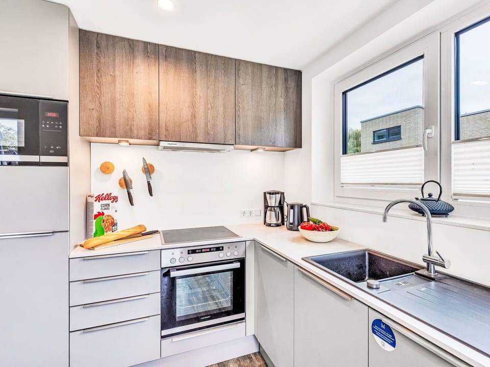 Kitchen, Kitchen Appliance, Countertop, Major Appliance, Home Appliance, Cabinetry, Flooring, Interior Design, Plumbing Fixture, Kitchen Sink