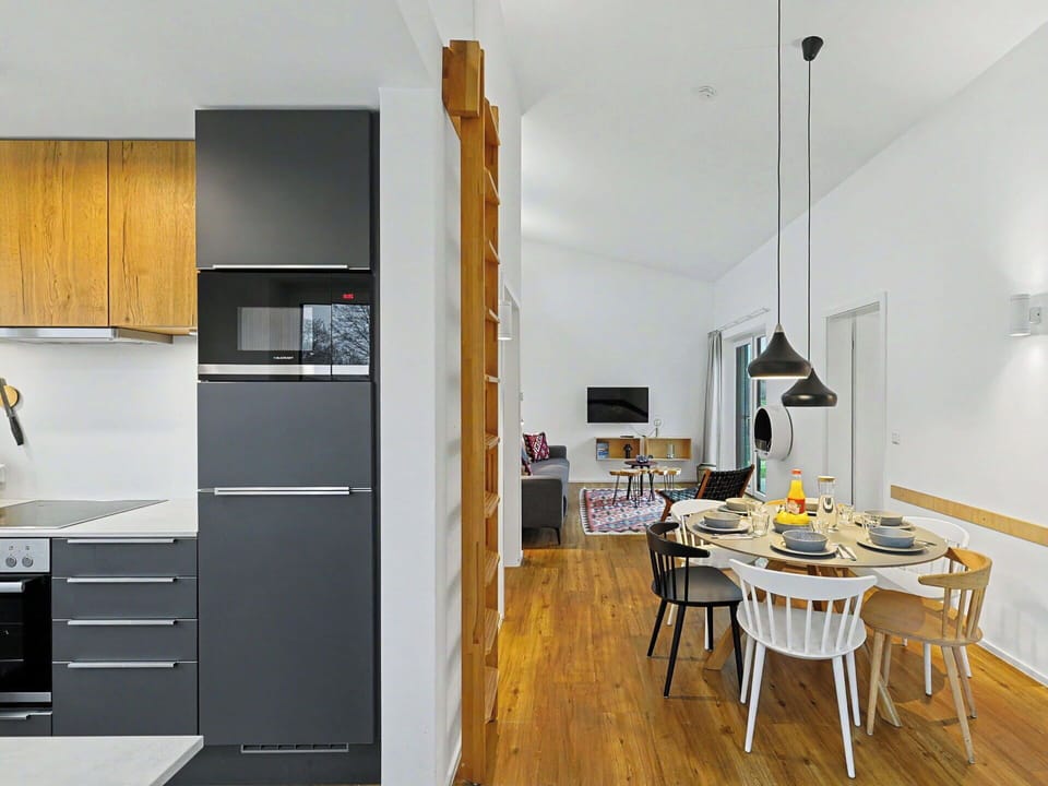 Furniture, Interior Design, Kitchen, Kitchen Appliance, Flooring, Floor, Countertop, Major Appliance, Wood, Chair