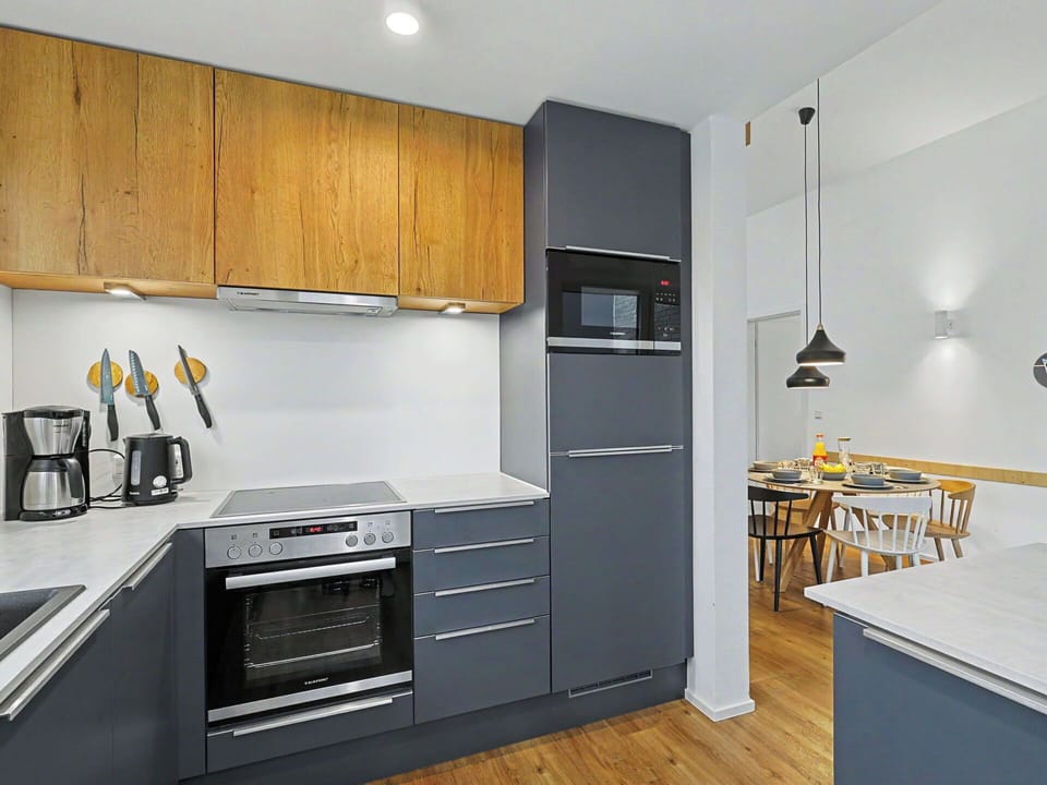 Kitchen Appliance, Kitchen, Furniture, Countertop, Cabinetry, Major Appliance, Interior Design, Flooring, Home Appliance, Wood