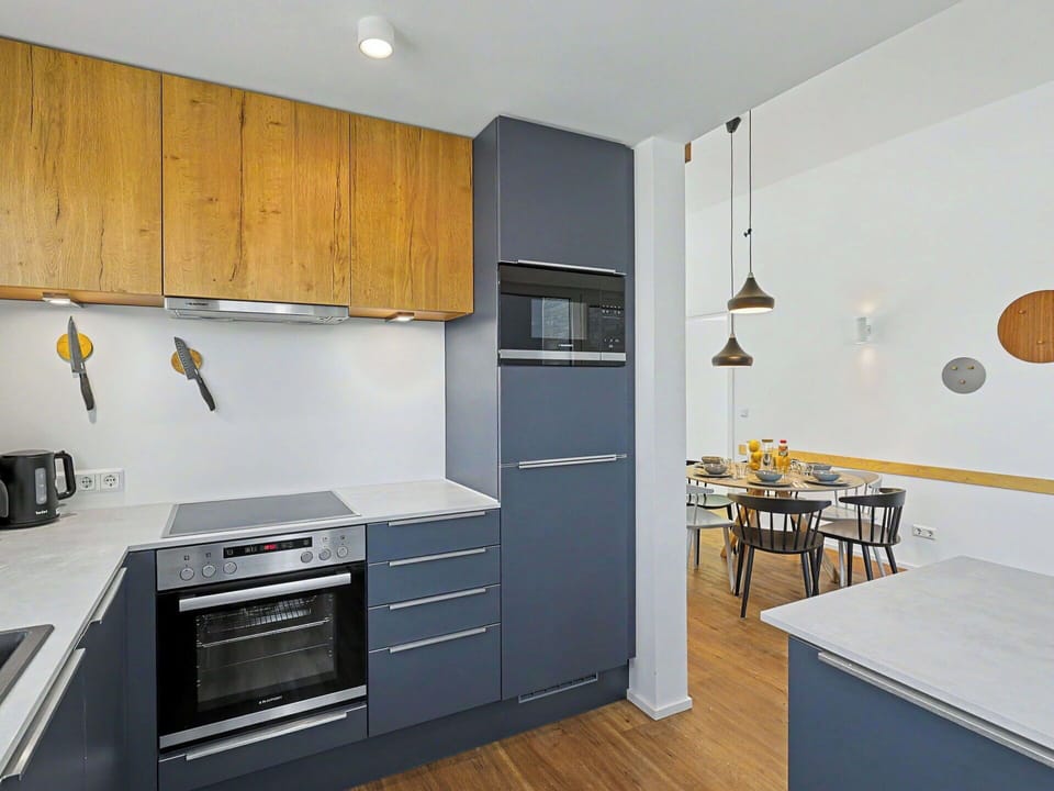 Kitchen Appliance, Kitchen, Furniture, Countertop, Cabinetry, Interior Design, Flooring, Major Appliance, Wood, Home Appliance