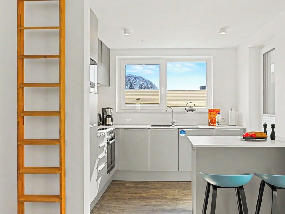 Furniture, Interior Design, Flooring, Kitchen, Wood, Floor, Countertop, Ceiling, Cabinetry, Major Appliance