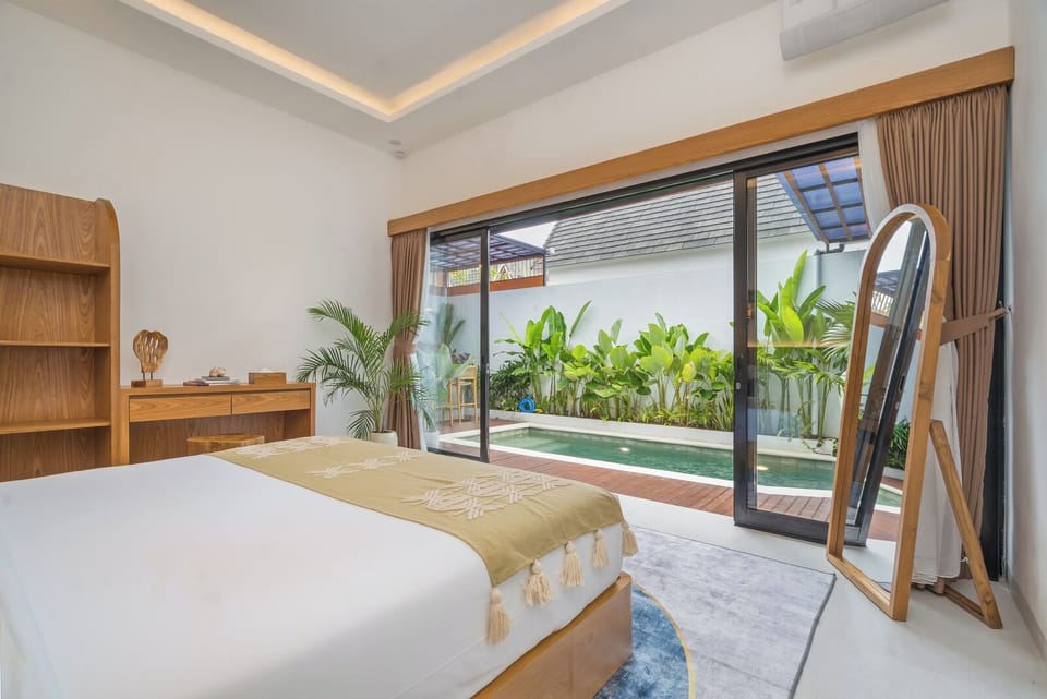 Villa, Pool View | In-room safe, desk, iron/ironing board, cribs/infant beds